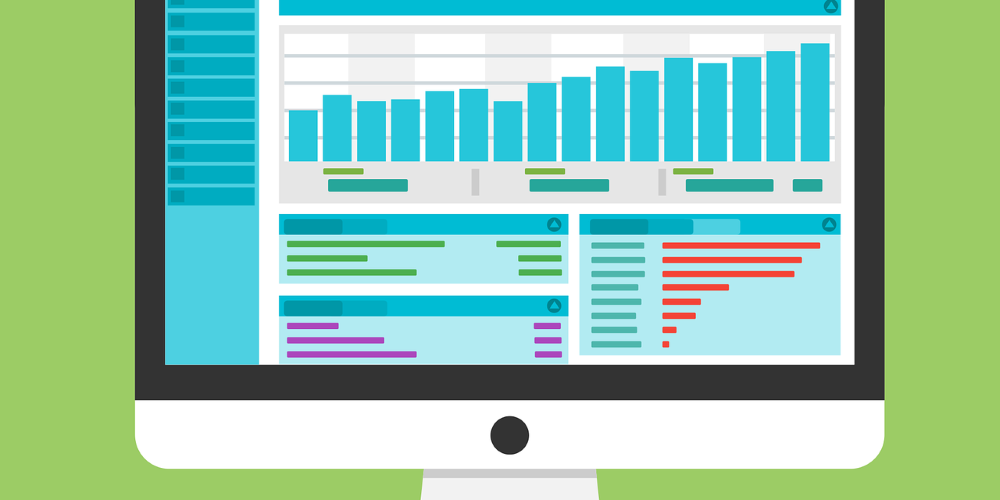 Graphic of a computer with a CMS open showing charts